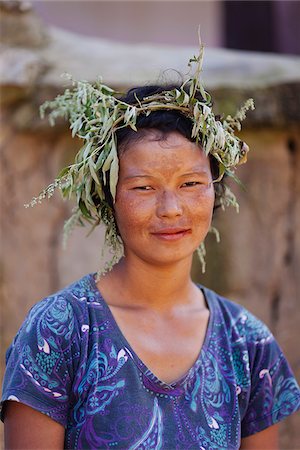 simsearch:862-05997030,k - Girl in Sopsokha village wearing a ringlet of grass on her head to protect against the sun. Stock Photo - Rights-Managed, Code: 862-05997039