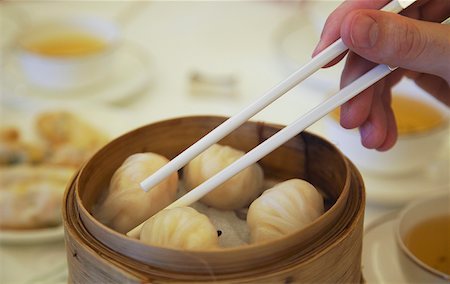 food culture - Shanghaiese dumplings at Maxim's dim sum restaurant, City Hall, Central, Hong Kong, China Stock Photo - Rights-Managed, Code: 862-05997176