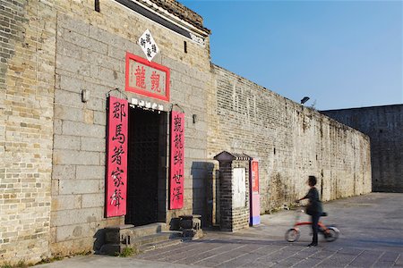 pushing door - Woman entering San Wai walled village, Fanling, New Territories, Hong Kong, China Stock Photo - Rights-Managed, Code: 862-05997209