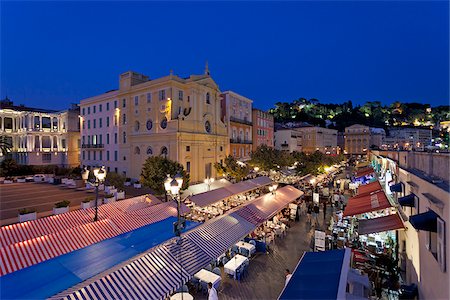 simsearch:862-05997674,k - Nice, Provence Alpes Cote d'Azur, France. The street market stalls and restaurants of Place Charles Felix in the old town of Nice  by night Foto de stock - Con derechos protegidos, Código: 862-05997665