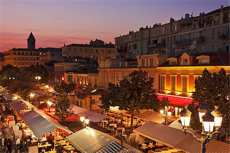 Nice, Provence Alpes Cote d'Azur, France. The street market stalls and restaurants of Place Charles Felix in the old town of Nice at sunset. Stock Photo - Rights-Managed, Code: 862-05997667