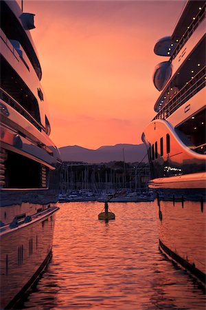 La Fontonne, Antibes, Provence Alpes Cote d'Azur, France. Luxury Superyachts moored in Port Vauban - Club Nautique d'Antibes at sunset Stock Photo - Rights-Managed, Code: 862-05997663