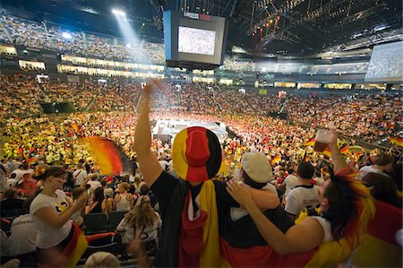 soccer fans - Europe, Germany, Westphalia, North Rhineland, Cologne, World Cup football fans at public viewing in Lanxess Arena Stock Photo - Rights-Managed, Code: 862-05997831