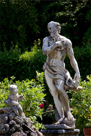 simsearch:862-05997928,k - Italy, Tuscany, Lucca. Details of statues at the Villa Pfanner gardens Stock Photo - Rights-Managed, Code: 862-05998011