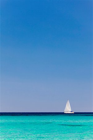 sardegna - Italy, Sardinia, Olbia-Tempo, Berchidda. A sailing boat out at sea. Stock Photo - Rights-Managed, Code: 862-05998250