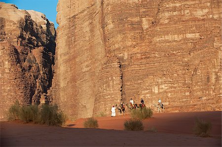 Camel Riding in the Wadi Rum, Jordan Foto de stock - Con derechos protegidos, Código: 862-05998284