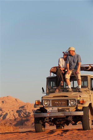 Couple on Jeep in the Wadi Rum, Jordan Stock Photo - Rights-Managed, Code: 862-05998282