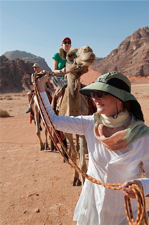 Camel Riding in the Wadi Rum, Jordan Stock Photo - Rights-Managed, Code: 862-05998290