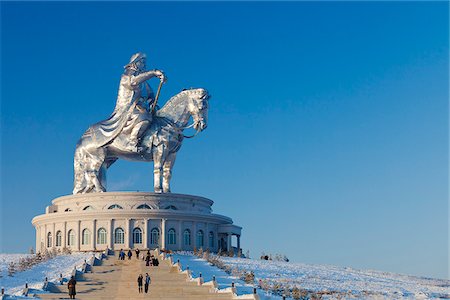 equestrian statues - Mongolia, Tov Province, Tsonjin Boldog. A 40m tall statue of Genghis Khan on horseback stands on top of The Genghis Khan Statue Complex and Museum. Stock Photo - Rights-Managed, Code: 862-05998618