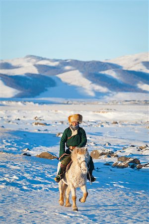 simsearch:862-05998642,k - Mongolie, Övörkhangaï, Orkkhon vallée. Il s'approche d'un homme à cheval au lever du soleil. Photographie de stock - Rights-Managed, Code: 862-05998639