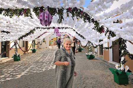 portugal village - Streets decorated with paper flowers. People festivities (Festas do Povo). Campo Maior, Portugal Stock Photo - Rights-Managed, Code: 862-05998848