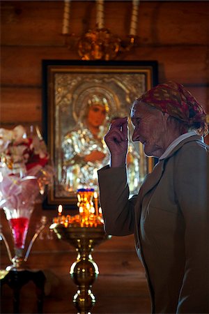 Sakhalin, Yuzhno-Sakhalin, Russia; During a Russian Orthodox ceremony in a traditonally wooden-built church Stock Photo - Rights-Managed, Code: 862-05999006