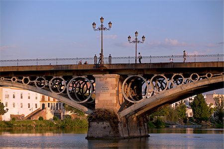 Spain, Andalusia, Seville; Detail of the Isabel II bridge crossing the Guadalquivir river Stock Photo - Rights-Managed, Code: 862-05999170