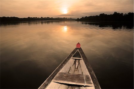 pirogue - Boat on the Amazon River, near Puerto Narino, Colombia Photographie de stock - Rights-Managed, Code: 862-06541046