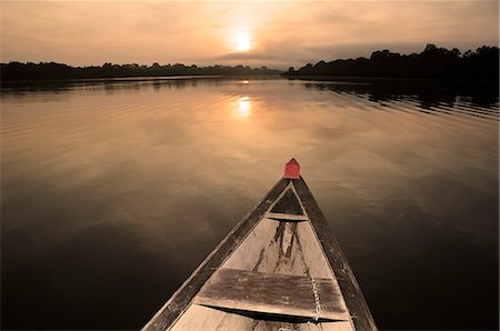 dugout boat - Boat on the Amazon River, near Puerto Narino, Colombia Stock Photo - Rights-Managed, Code: 862-06541046