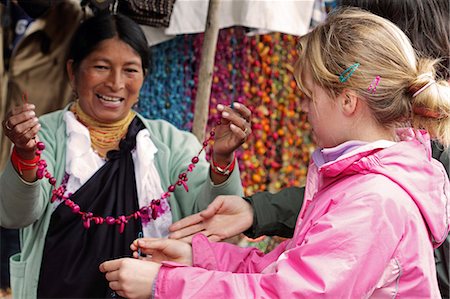 Girl shopping for necklaces at Otavalo Market, Ecuador Stock Photo - Rights-Managed, Code: 862-06541260