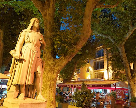 simsearch:862-06541488,k - France, Provence, Orange, Place de la Republic, Rimbaud 11 statue at dusk Photographie de stock - Rights-Managed, Code: 862-06541556