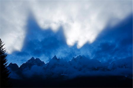 simsearch:862-06541437,k - Europe, France, French Alps, Haute Savoie, Chamonix, shadow cast by the Aiguille du Midi Photographie de stock - Rights-Managed, Code: 862-06541567