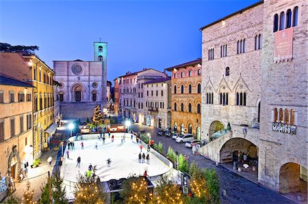 people in italy - Italy, Umbria, Perugia district, Todi. Ice skating in Piazza del Popolo. Stock Photo - Rights-Managed, Code: 862-06542068