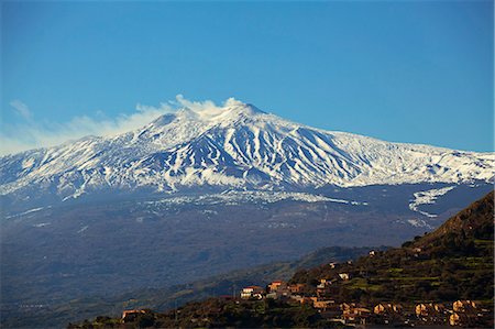 scenic photos of taormina italy - Taormina, Sicily, Italy, The Etna, Sicilys active volcano covered in snow Stock Photo - Rights-Managed, Code: 862-06542123