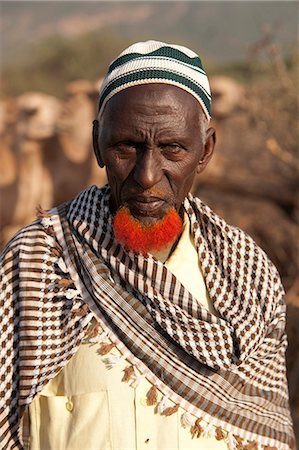 pastoralist - Isiolo, Northern Kenya. A traditional Somali nomadic herdsmen at the watering hole. Stock Photo - Rights-Managed, Code: 862-06542278