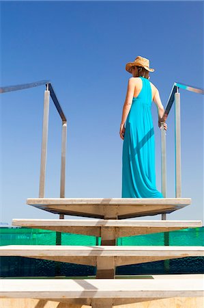 Lebanon, Beirut. A woman stands by the swimming pool at the Le Gray Hotel. MR. Foto de stock - Con derechos protegidos, Código: 862-06542336