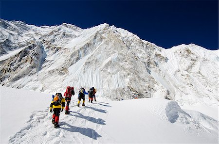 Asia, Nepal, Himalayas, Sagarmatha National Park, Solu Khumbu Everest Region, climbers walking below Nuptse making their way to camp 2 on Mt Everest Photographie de stock - Rights-Managed, Code: 862-06542458