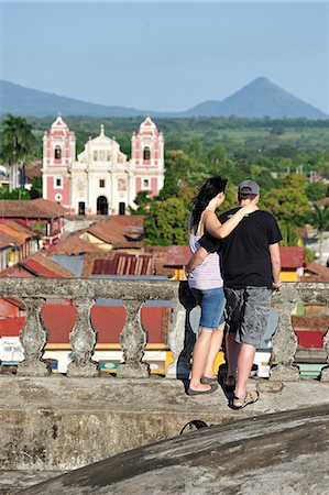 Couple enjoying the view from Cathedral to Iglesia de la Asuncion, Leon, Nicaragua, Central America Photographie de stock - Rights-Managed, Code: 862-06542514