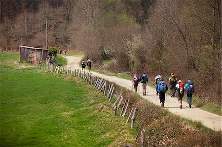 simsearch:862-06677388,k - Spain, Galicia, Camino Frances, Youths walking along the trail of the Camino Stock Photo - Rights-Managed, Code: 862-06542836