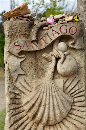 Spain, Galicia, Camino Frances, The symbol of the shell with the Santiago inscription on a slabstone Photographie de stock - Rights-Managed, Code: 862-06542838