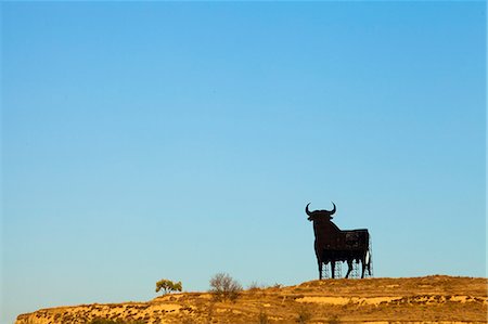 Bull silhouette, classic symbol on the roads of Spain, La Rioja, Spain Stock Photo - Rights-Managed, Code: 862-06542881