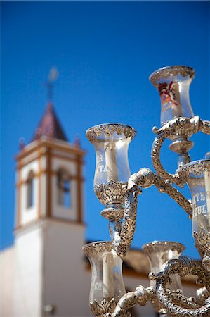 el rocio - El Rocio, Huelva, Southern Spain. Detail of lamps on a cart and church tower during the annual Romeria Foto de stock - Con derechos protegidos, Código: 862-06542966
