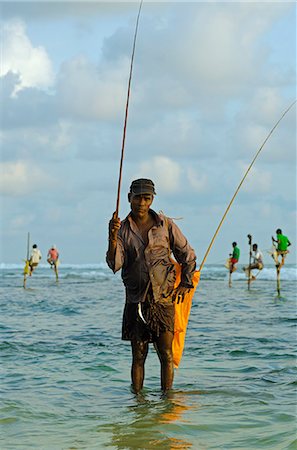 Sri Lanka, Dalawella, Indian Ocean, stilt fishermen Stock Photo - Rights-Managed, Code: 862-06542984