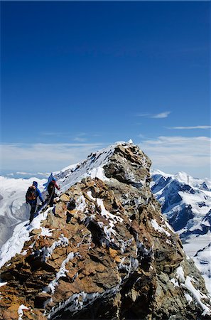simsearch:862-06541973,k - Europe, Switzerland, Swiss Alps, Valais, Zermatt, climber on summit of The Matterhorn , 4478m, Stockbilder - Lizenzpflichtiges, Bildnummer: 862-06543091