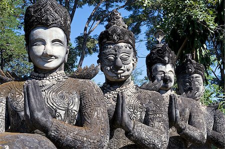 Thailand, Nong Kai Province, Sala Keoku Sculpture park. Built by, and reflecting, the personal vision of Luang Pu Bunleua Sulilat and his followers , the construction started in 1978, the park shares the style of his earlier Buddha Park on the Lao side of Mekong, but is marked by even more extravagant fantasy and greater proportions. Photographie de stock - Rights-Managed, Code: 862-06543125