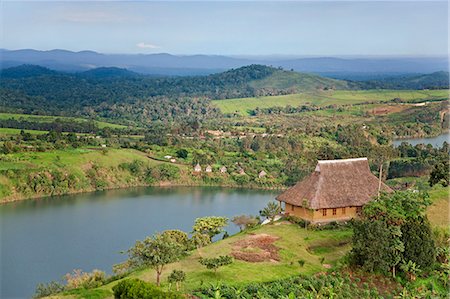Lake Nyinabulitwa is one of the many crater lakes of volcanic origin in the beautiful Ndali Kasenda crater lakes region, south of Fort Portal, Uganda, Africa Stock Photo - Rights-Managed, Code: 862-06543197