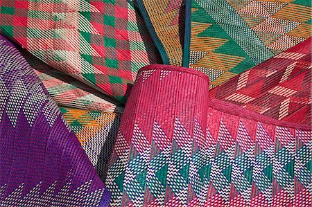 palmwedel - Colourful woven mats, omukeka, are made from palm fronds and are widely sold in Uganda, Africa Stockbilder - Lizenzpflichtiges, Bildnummer: 862-06543207