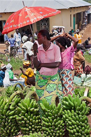 roadside man - A woman selling green bananas, matoke, at a roadside market, Uganda, Africa Stock Photo - Rights-Managed, Code: 862-06543211