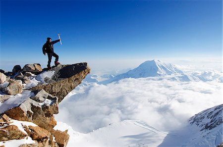 subir - USA, United States of America, Alaska, Denali National Park, Mt Huntington , 4257m, and climber on Mt McKinley 6194m, highest mountain in north America , MR, Foto de stock - Con derechos protegidos, Código: 862-06543342