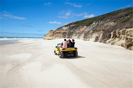 simsearch:862-06675755,k - South America, Brazil, Ceara, Morro Branco, tourists riding along a long sandy beach next to the sandstone cliffs near Morro Branco Foto de stock - Con derechos protegidos, Código: 862-06675757