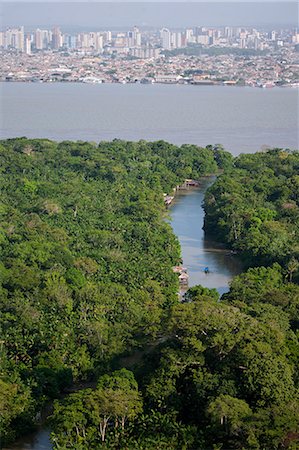 simsearch:862-03360689,k - South America, Brazil, Para, Amazon, an aerial shot of the city of Belem on Guajara Bay in the southern mouth of the Amazon confluence with a creek, mangrove and stilt houses in the foreground Foto de stock - Con derechos protegidos, Código: 862-06675921