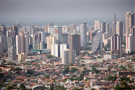 South America, Brazil, Para, Amazon, an aerial shot of the city of Belem in the mouth of the Amazon showing skyscraper apartment blocks Foto de stock - Direito Controlado, Número: 862-06675936
