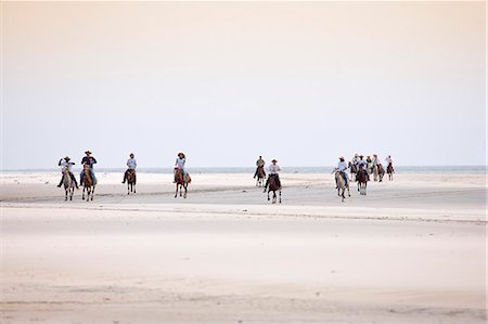 South America, Brazil, Para, Amazon, Marajo island, tourists on horseback riding on the beach near Soure Stock Photo - Rights-Managed, Code: 862-06675967