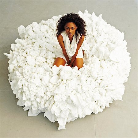 simsearch:862-06676098,k - South America, Brazil, Sao Paulo, a model sits on a pouffe made from recycled material by the artist and designer Nido Campolongo Foto de stock - Con derechos protegidos, Código: 862-06676122