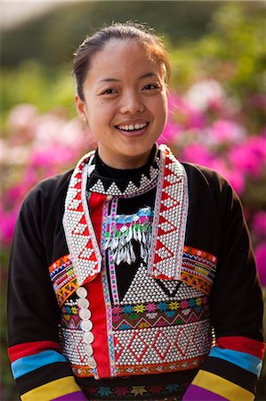 simsearch:862-06676338,k - China, Yunnan, Xinping. A lady belonging to the Huayao Dai ethnic minority group. Stock Photo - Rights-Managed, Code: 862-06676229