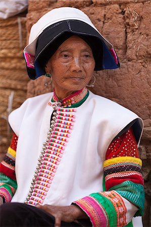 female elderly - China, Yunnan, Xingmeng. A Mongolian elder in the small village of Xingmeng, west of Tonghai, where some 4000 Mongolian descendants of members of Kublai Khan s expeditionary force still reside. Stock Photo - Rights-Managed, Code: 862-06676239