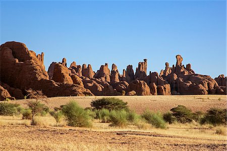 simsearch:862-06676493,k - Chad, Bechike, Ennedi, Sahara. A spectacular landform of weathered Palaeozoic sandstone. Fotografie stock - Rights-Managed, Codice: 862-06676464