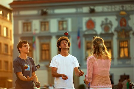 Central and Eastern Europe, Czech Republic, South Bohemia, Ceske Budejovice. Three youyhs playing in the historical centre Photographie de stock - Rights-Managed, Code: 862-06676627