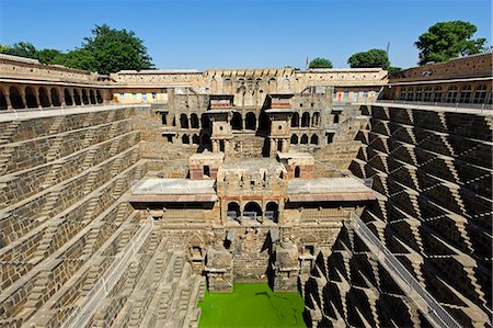 India, Rajasthan, Abhaneri. Originally excavated in the 9th century, Chand Baori (or Chand Stepwell) is among the largest and deepest such wells in Rajasthan. Stock Photo - Rights-Managed, Code: 862-06676839