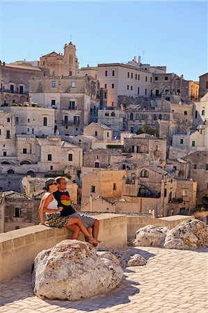 female travel photo - Italy, Basilicata, Matera district, Matera, Sassi di Matera, meaning stones of Matera, Stock Photo - Rights-Managed, Code: 862-06677086